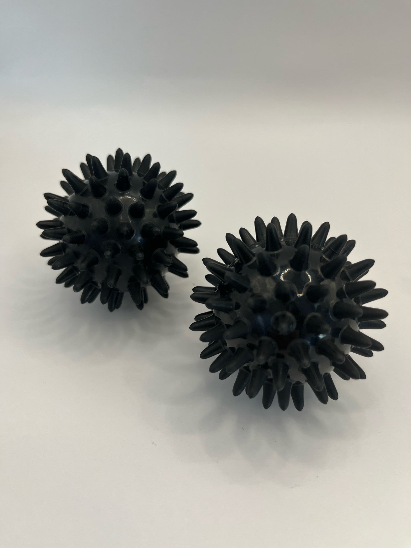 Acupressure massage balls. Black, . 6cm diameter. PVC. Use in pregnancy and labour to aid pain relief and muscle relaxation.