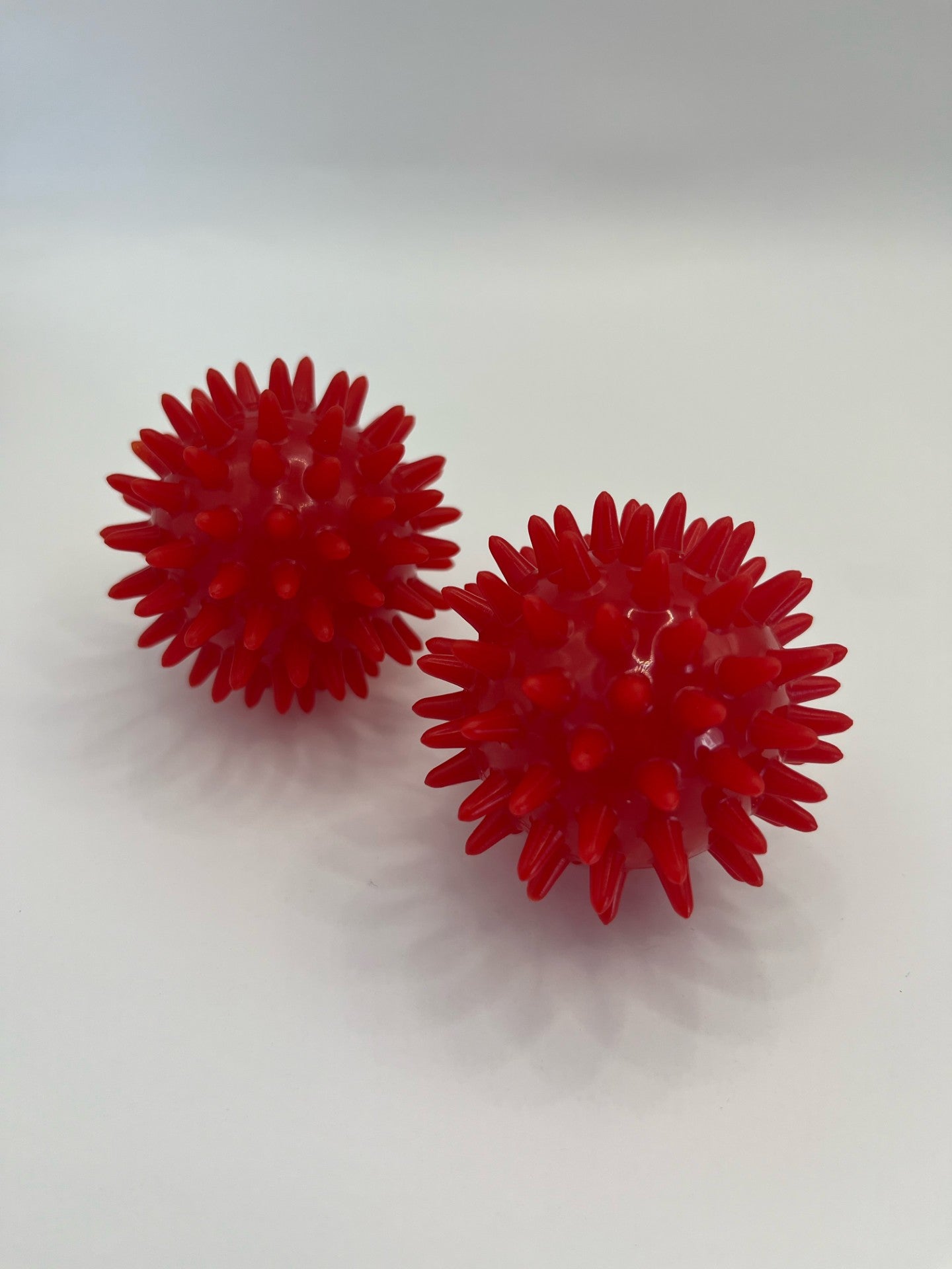 Acupressure massage balls. Red, . 6cm diameter. PVC. Use in pregnancy and labour to aid pain relief and muscle relaxation.