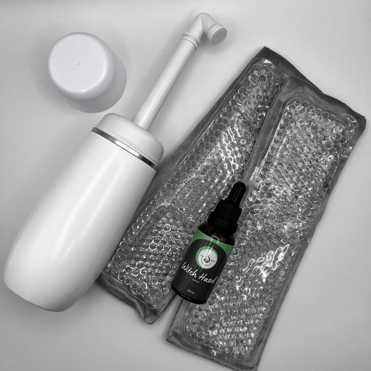 Cleaning tool with a bottle of liquid on a gray background