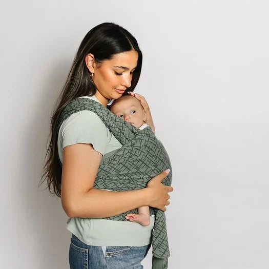 Image. The versatile MOBY Wrap offers multiple carrying positions as baby grows, plus one-size-fits-all comfort for parents and caregivers . 100% cotton.